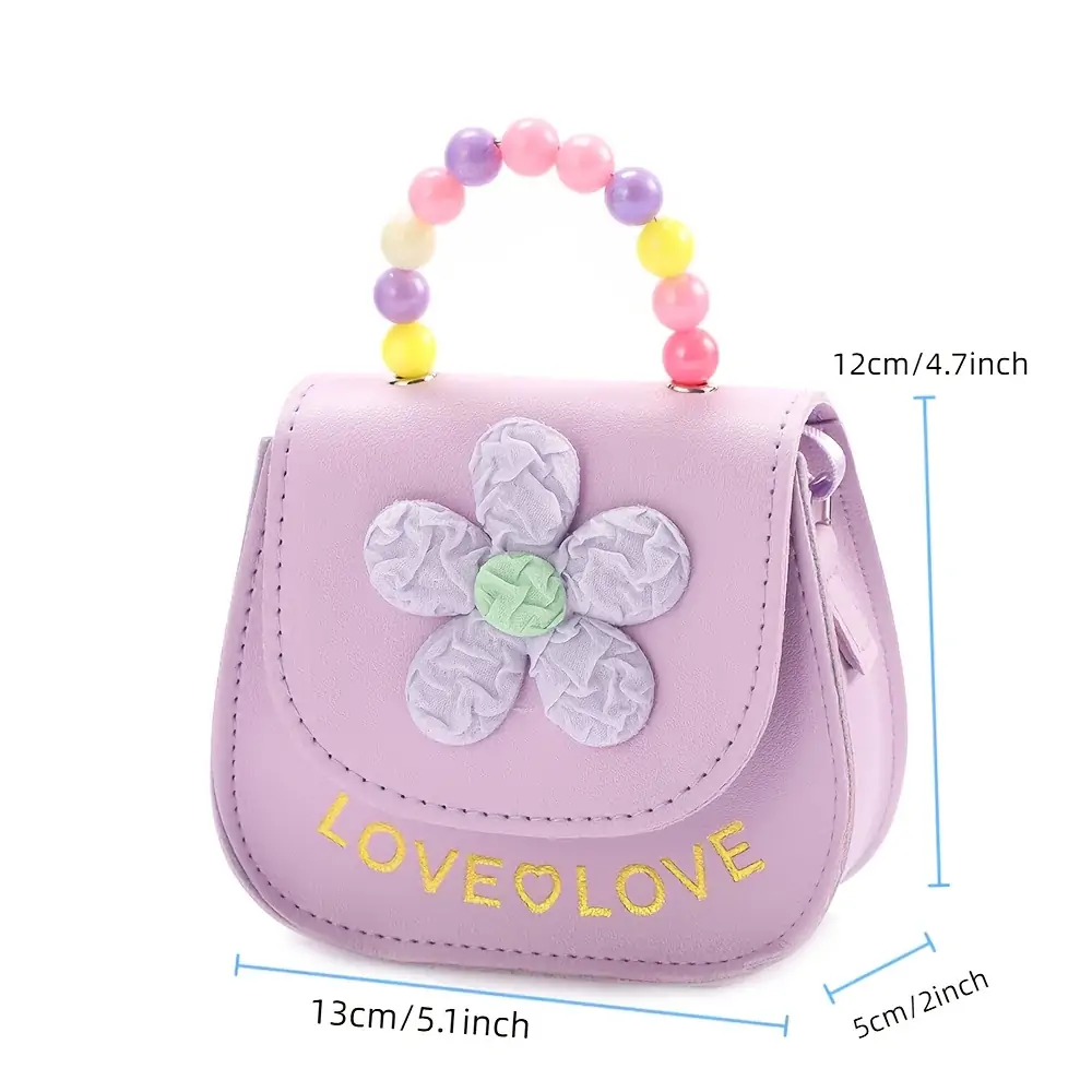 product-fancy-a97c2d32-a05f-4e5e-8c89-e4c6e0963bb7 Детска чантичка с голямо цвете и акцент върху дръжката, цветна чанта за момиче